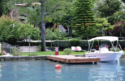 Yenion Villa | Magnífica villa frente al mar con piscina privada, embarcadero, lancha motora incluida y sauna