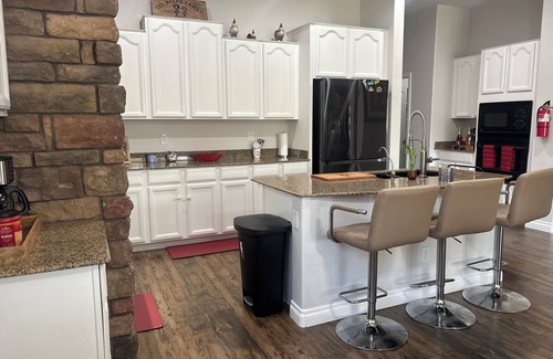 Copper Canyon Ranch Casa | Spacious 4-bedroom house in charming Surprise with resort style backyard.