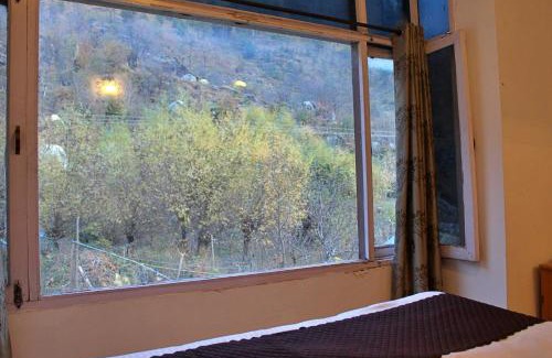Bashisht Cama Y Desayuno | Sylvan Woods Cottage