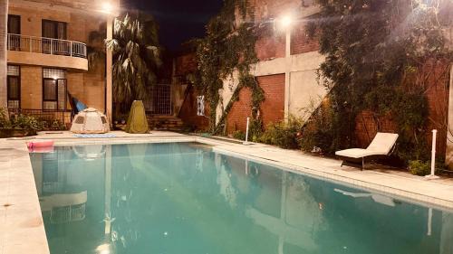 Agra Otro | Taj Waves - Poolside Tent in a Peaceful Retreat