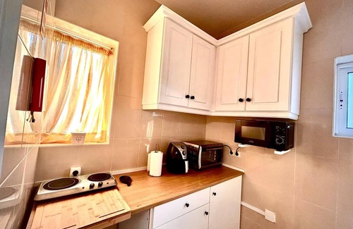 Braga Apartamento | Tómate un descanso y relájate en nuestra encantadora casita.