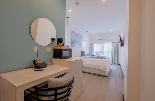 San Pedro Hotel | Take in the stunning view of the barrier reef in our ocean-view studio!