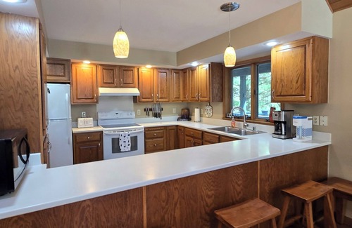 Swanton Casa | Tall Pines- 5-bedroom with hot tub and dock slip!