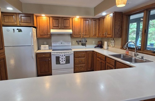 Swanton Casa | Tall Pines- 5-bedroom with hot tub and dock slip!