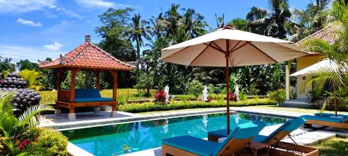 Melayang Cama Y Desayuno | TAMAN EDEN COTTAGE