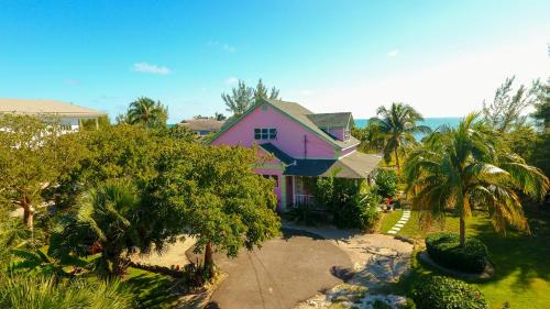 Nassau Apartamento | Tangerine Sunsets Castaway by the sea