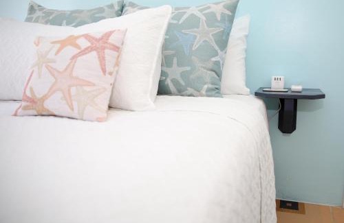 Nassau Apartamento | Tangerine Sunsets Castaway by the sea