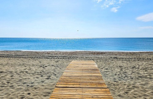 Alcorrin Apartamento | Tasteful vacation apartment with shared outdoor pool and beautiful sea view.
