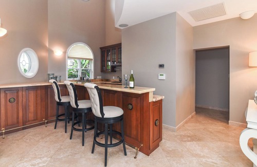 South Sound Casa | Tatenda: Spacious, Beachfront Villa with Private Pool, & Balcony Suites