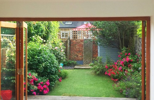 Wimbledon Park Casa | Encantador hogar inglés con hermosa chimenea y jardín en Wimbledon (Veeve)
