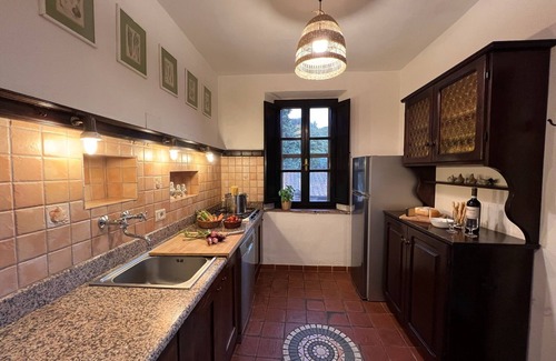 Castagneto Carducci Apartamento | "Terrazza" apartment in a country house, garden, sea view 6 km to the sea