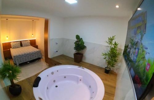 Maria Eugenia Apartamento | TH Flats 101 com Banheira de Hidromassagem
