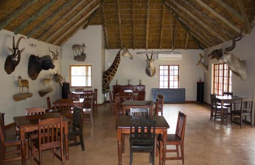 Madibeng Cabina | Thabaledi Game Lodge