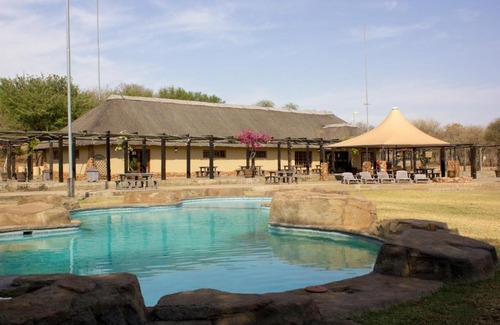 Madibeng Cabina | Thabaledi Game Lodge