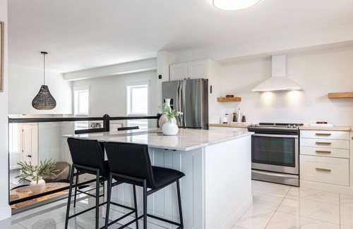 Kitchener Casa | The Atrium: A Home in Full Bloom