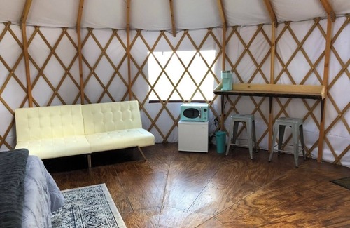Emory Cabina | The Bluebonnet Yurt is a romantic yurt getaway with private outdoor shower