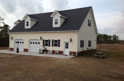 Cedar Island Casa | The Boathouse, una cabaña de vacaciones / caza y pesca de clase mundial