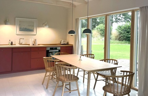 Ulsnis Casa | The "Bootshaus" is located in quiet Ulsnis with a lot of nature around the house, just behind the coach house at the ferry house, plus its own garden of approx. 1000m², which is currently still in the growth phase, pure nature