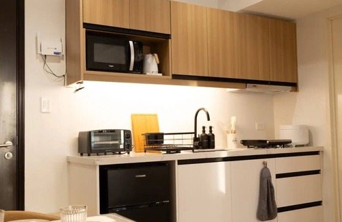 Silang Junction South Condominio | The Cabin Ayala Serin by John Morales