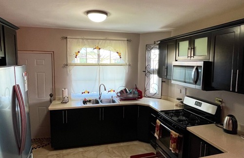 Spanish Town Casa | "The Chandelier" Modern & Comfortable Home