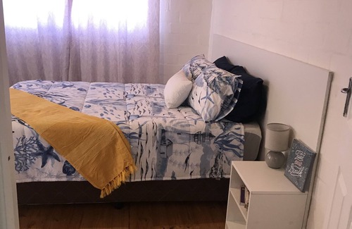 Capri Cabaña | The cottage on 24 De Stadler Avenue between 2 popular beaches and Shopping Mall