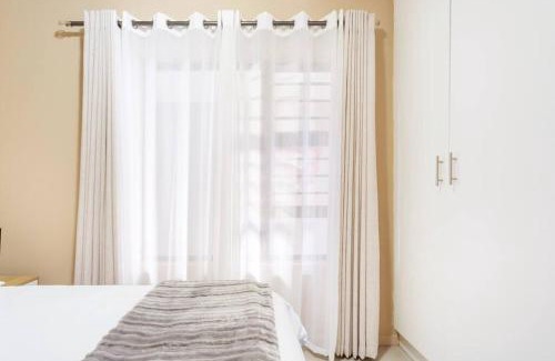 Bloubergstrand Apartamento | The Cozy Retreat, 2-bedroom Apartment in Parklands, Cape Town