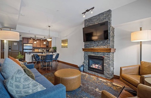 Cougar Creek Hotel | The Den | Outdoor Hot Tub + Pool | Walkout Patio