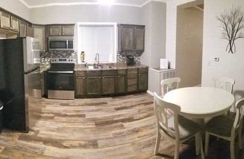 Guttenberg Casa | “The Depot” 2bedroom “3beds” 1 bath home. Outdoor party area with tv
