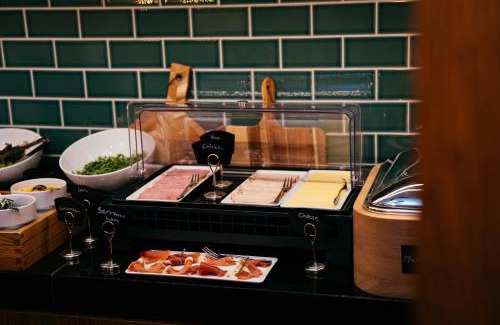Nieuwmarkt en Lastage Hotel | The Hendrick's Hotel