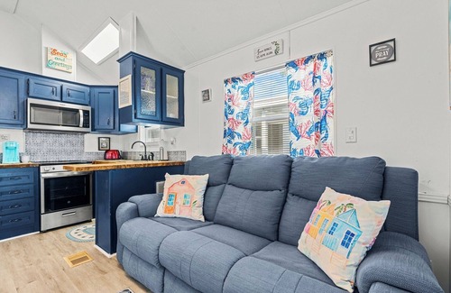 Upper Grand Lagoon Casa | The Little Love Bug: 2-pup friendly, golf cart, screened porch, near beach/pool