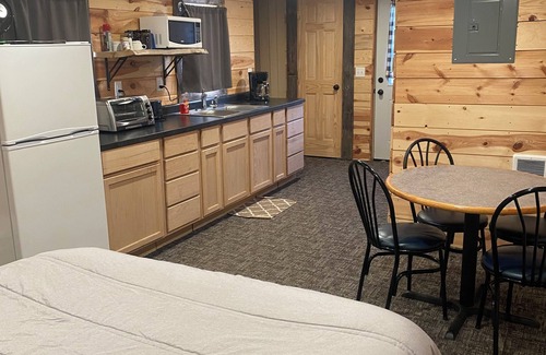 Luverne Cabina | The Little Red Barn - Lakeside Tiny Home Rental -Sleeps 4 - Spiral Staircase