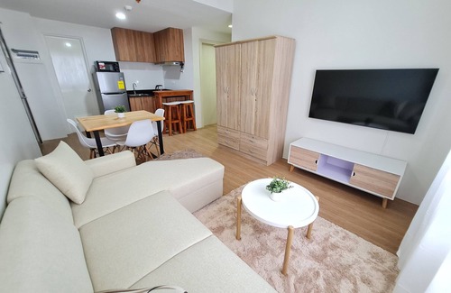 Cagayan de Oro Condominio | The Loop 2-BR CONDO Fully Air-conditioned with Wifi, Sofa Bed & Water Dispenser