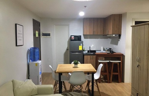 Cagayan de Oro Condominio | The Loop 2-BR CONDO Fully Air-conditioned with Wifi, Sofa Bed & Water Dispenser