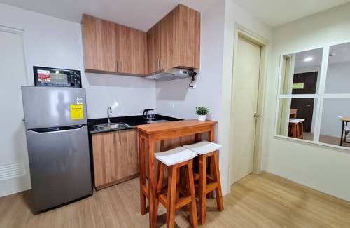 Cagayan de Oro Condominio | The Loop 2-BR CONDO Fully Air-conditioned with Wifi, Sofa Bed & Water Dispenser
