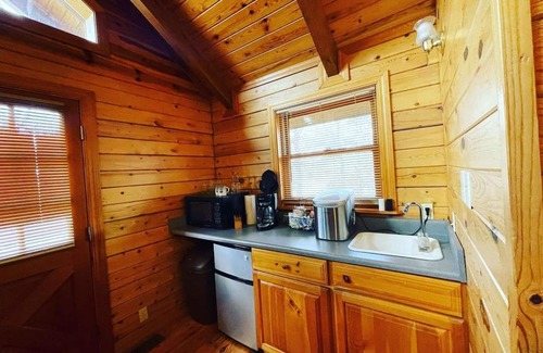 Eureka Springs Cabina | La cabaña de lujo en Bear Mountain Log Cabins