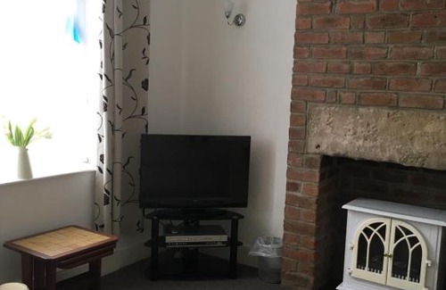 Millhouse Green Casa | The One in the Middle