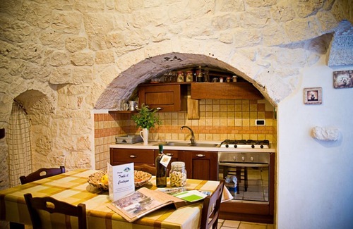 Martina Franca Casa | Il Panoramico: 1800s trullo house with vineyard and Itria Valley views