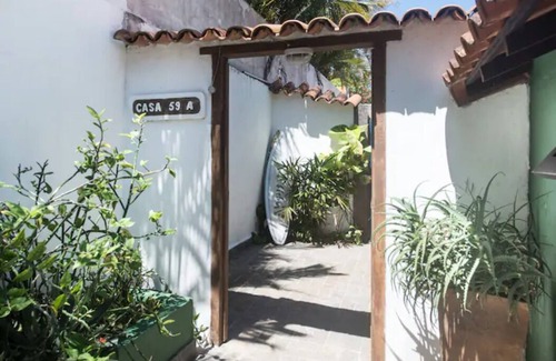 Joao Fernandes Casa | La casa en la playa perfecta con la cubierta, barbacoa, piscina y vistas al mar.