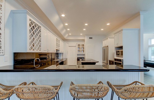 Belleair Beach Casa | The Pink Palace- Gulf front townhouse with private pool & large patio, sleeps 12