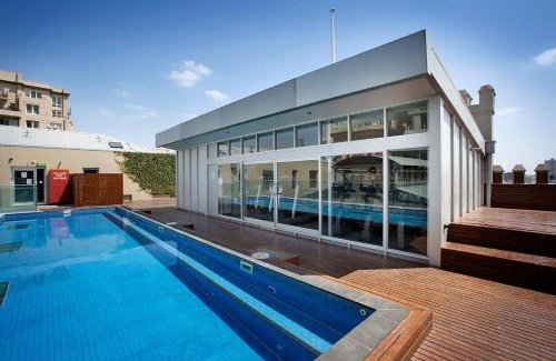 East Melbourne Apartamento | The Powlett - East Melbourne by Ready Set Stay