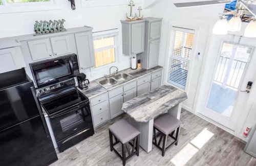 Rockport Cabaña | The Rattle Trap Tiny house fenced yard