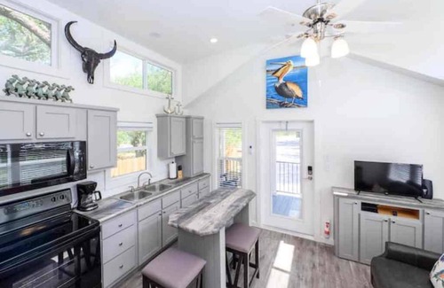 Rockport Cabaña | The Rattle Trap Tiny house fenced yard