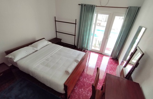 Kumbalam Cama Y Desayuno | The Reds Heritage.nSpacious rooms, vast gardens with a refreshing pool.