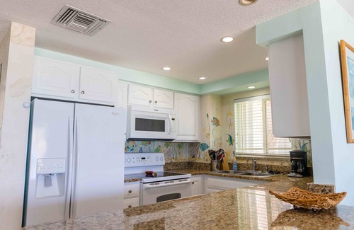 Rum Point Condominio | The Retreat at Rum Point Unidad # 28. Impresionante condominio Penthouse frente al mar 3BR