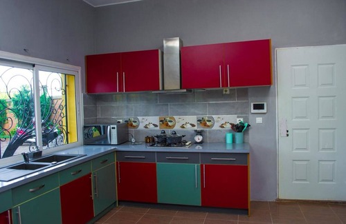 Ambohibao Villa | El ambiente romántico de la habitación roja para descubrir el placer de una estancia.