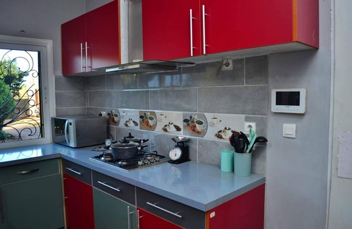 Ambohibao Villa | El ambiente romántico de la habitación roja para descubrir el placer de una estancia.