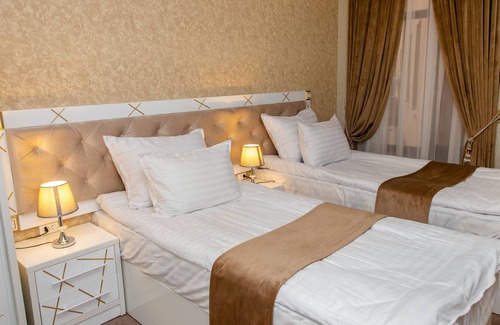 Navoiy Cama Y Desayuno | The Royal Hotel