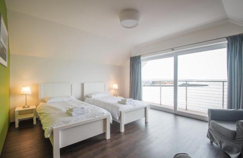 Bowmore Apartamento | The Saddlers House - best price per bed