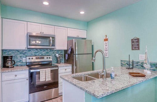 Key Allegro Condominio | The Salty Aloha | Pet Friendly, Personal Boat Slip