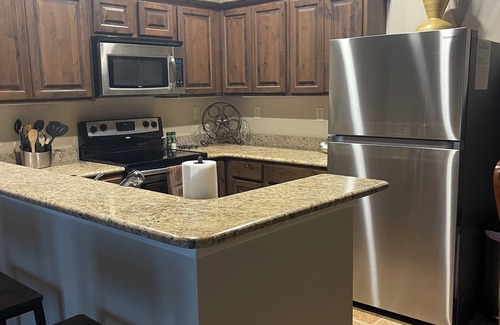 Gruene Condominio | The State Haus in Gruene! Walk to Gruene Hall and much more! Tube from property